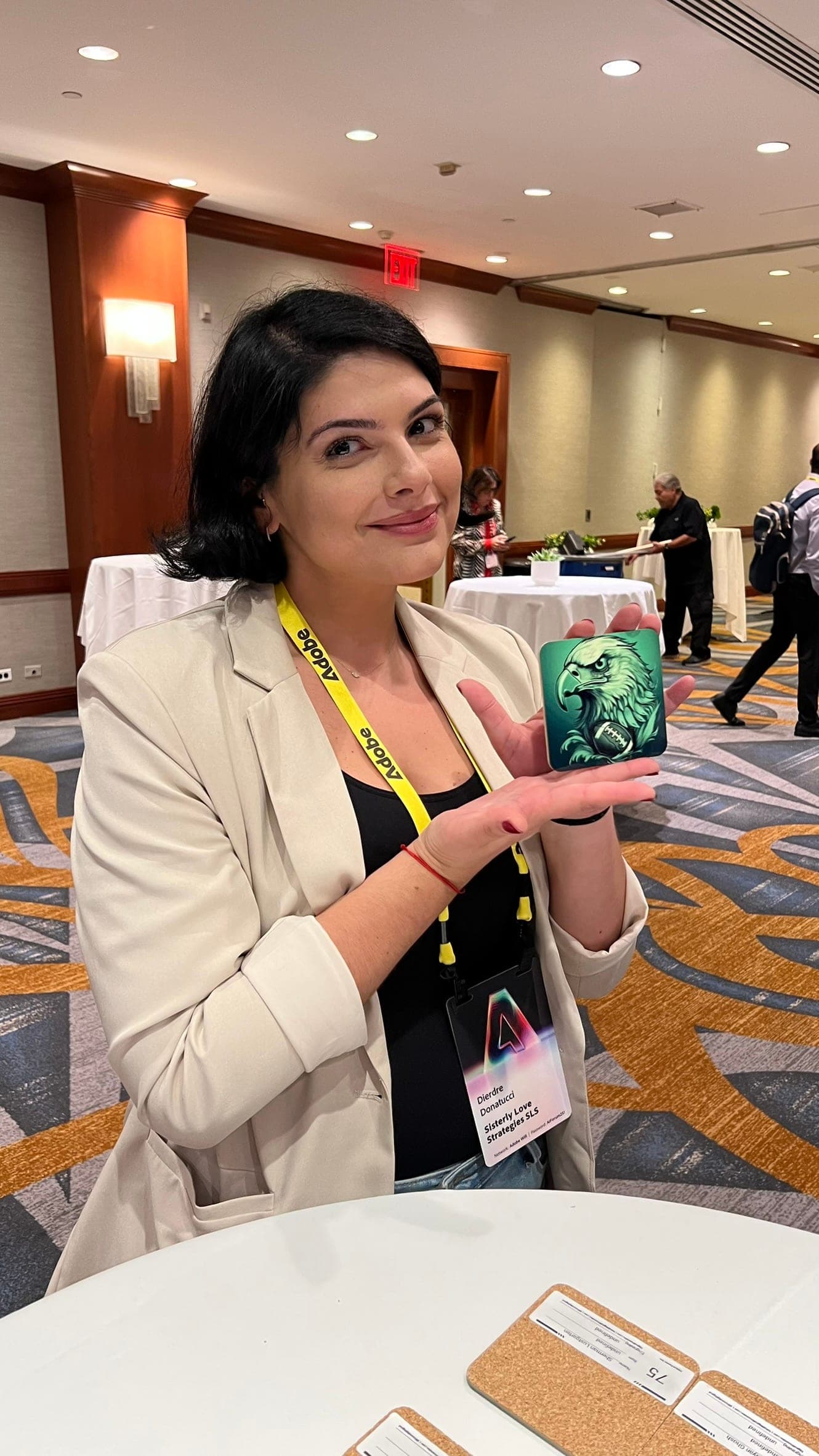 Guest presenting a personalized custom item at an event